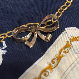 Elegant Gold Bow Brooch